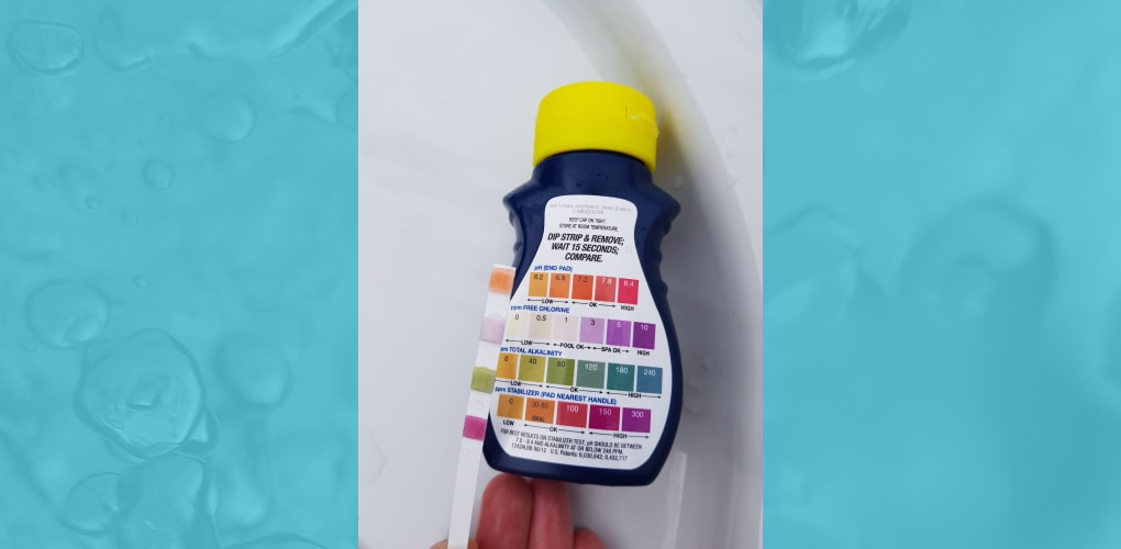 chlorine test strip and bottle