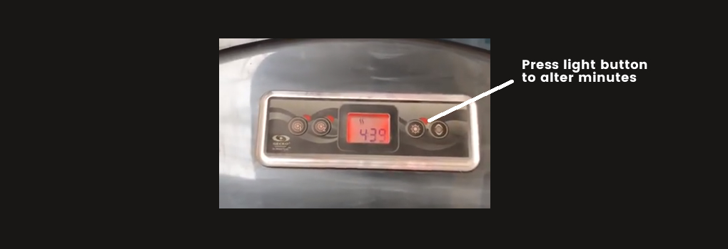 control panel with arrow to light button